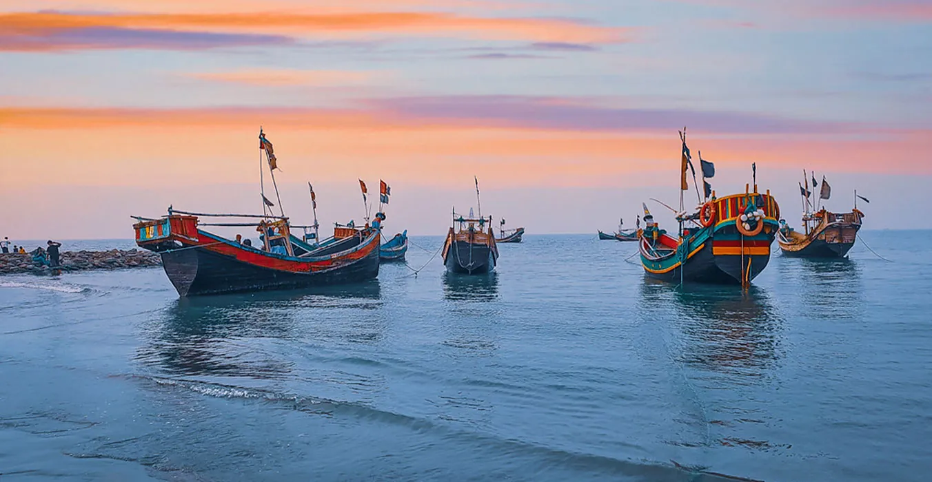 Sunset over the painted boats