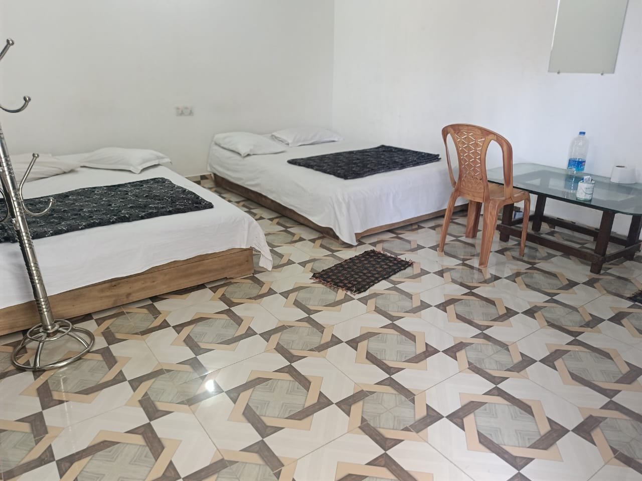 Shahjalal Resort Saint Martin, room 114, Two beds, patterned floor